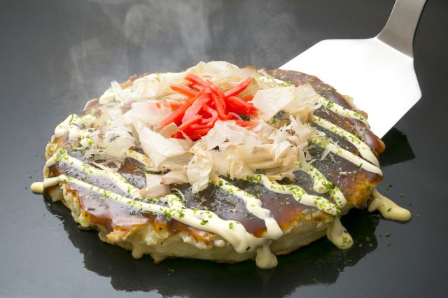 Okonomiyaki: Regional Styles, Recipes, and Global Influence